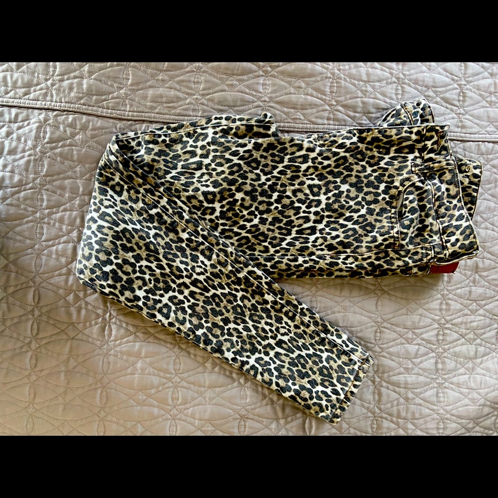 American Eagle leopard print skinny jeans.